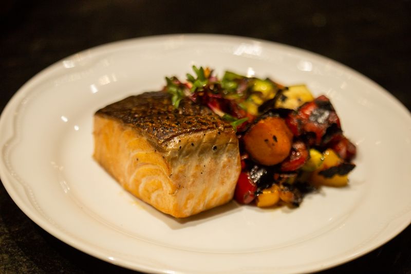 Grilled salmon fillet with vegetables